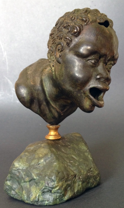 A Renaissance Bronze Oil Lamp after a Roman Head of a Nubian