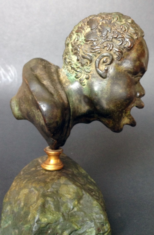 A Renaissance Bronze Oil Lamp after a Roman Head of a Nubian