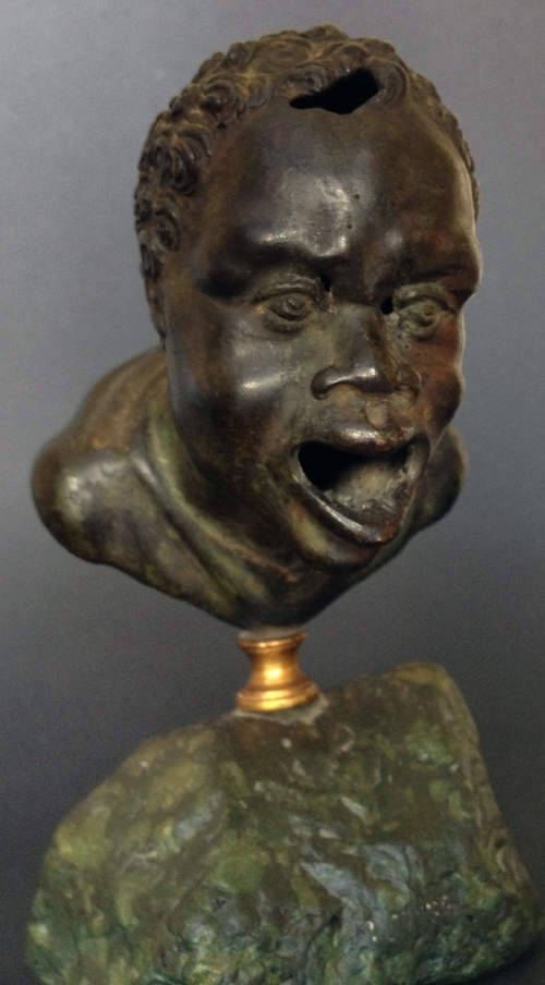 A Renaissance Bronze Oil Lamp after a Roman Head of a Nubian