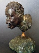 A Renaissance Bronze Oil Lamp after a Roman Head of a Nubian