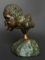 A Renaissance Bronze Oil Lamp after a Roman Head of a Nubian