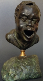 A Renaissance Bronze Oil Lamp after a Roman Head of a Nubian
